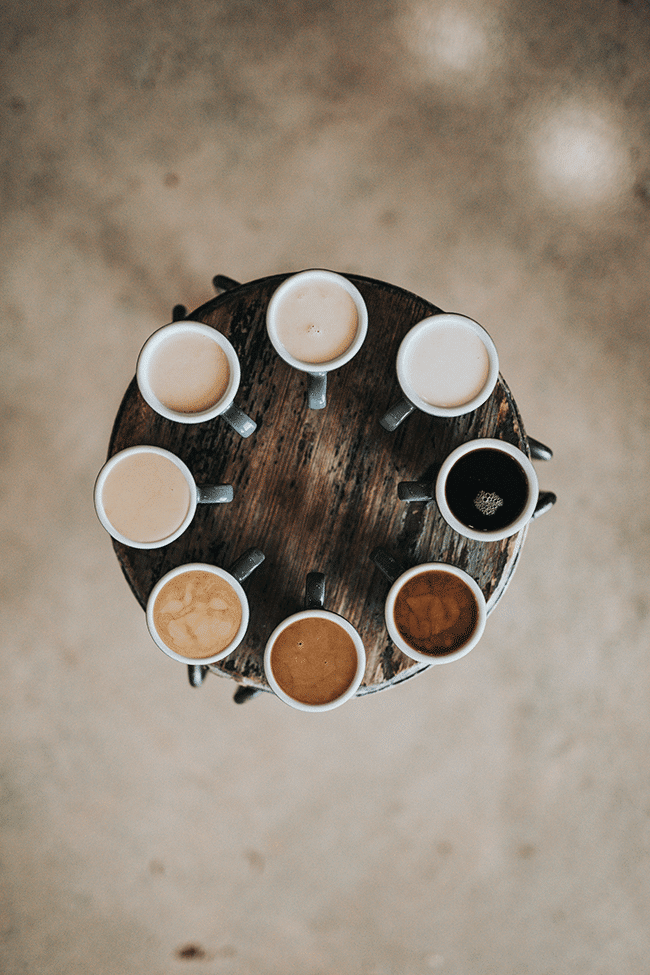 Cups of coffee on a table