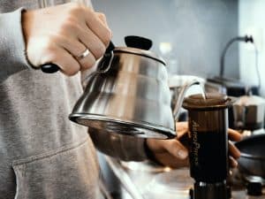 Female brewing with an Aeropress