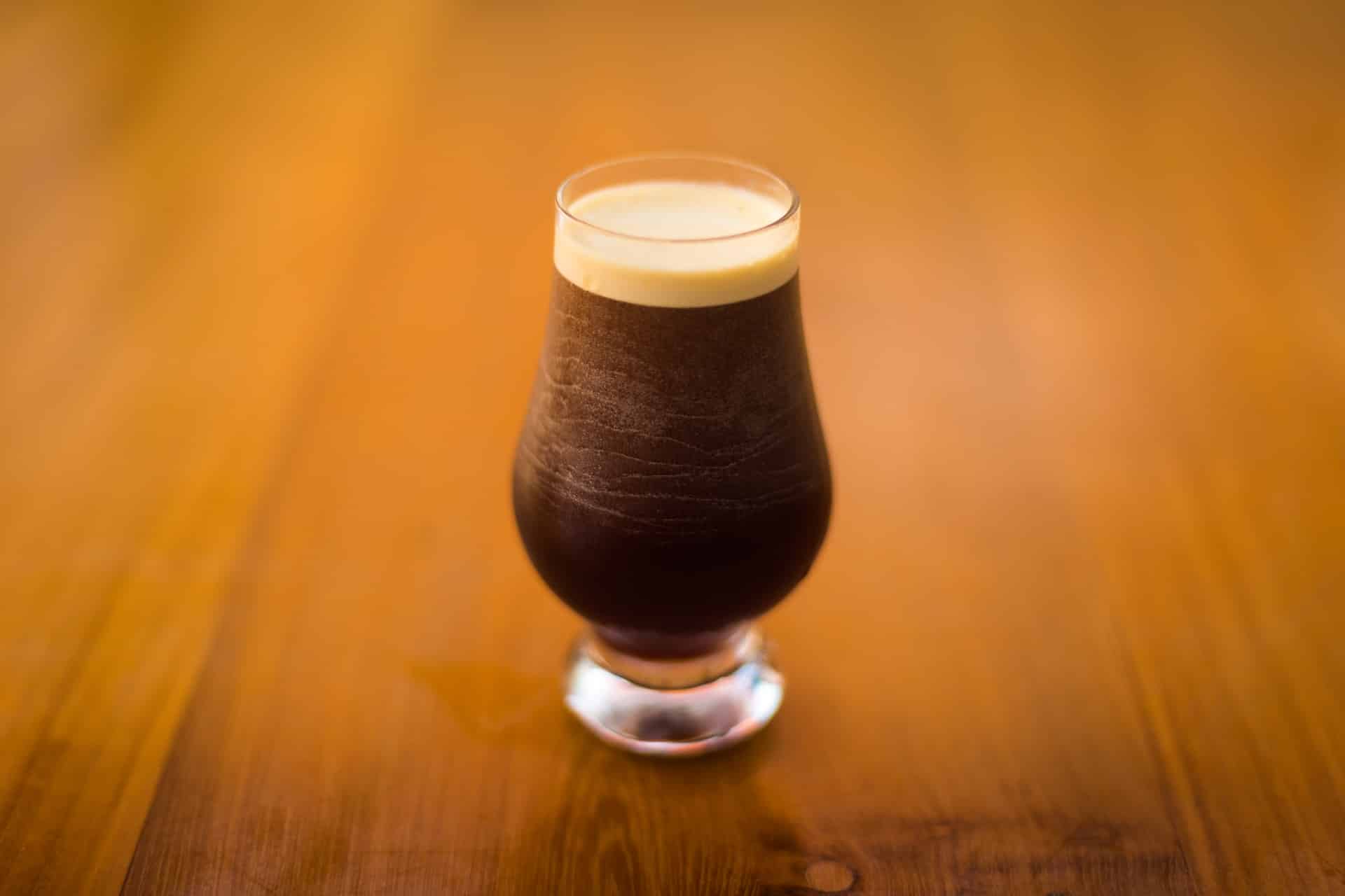 nitro cold brew in a fancy glass